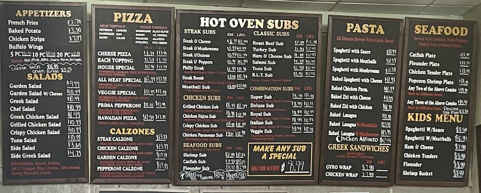Printed menu featuring burgers, salads, and subs.